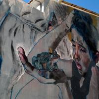 Graffiti mirando a un sapo en Fanzara